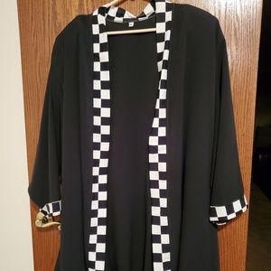 Black swing style jacket with checkered trim